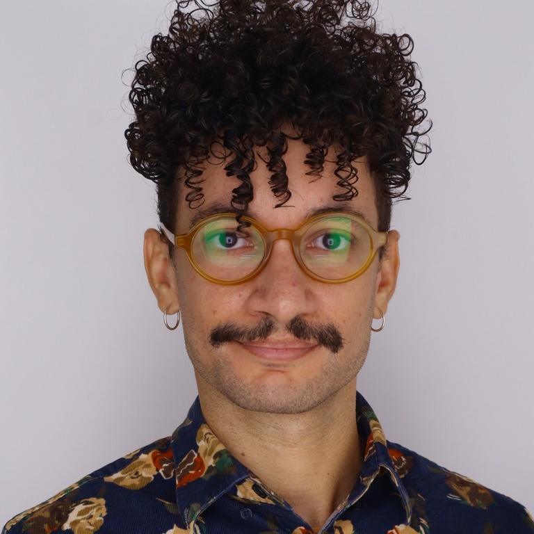 portrait of a man in glasses