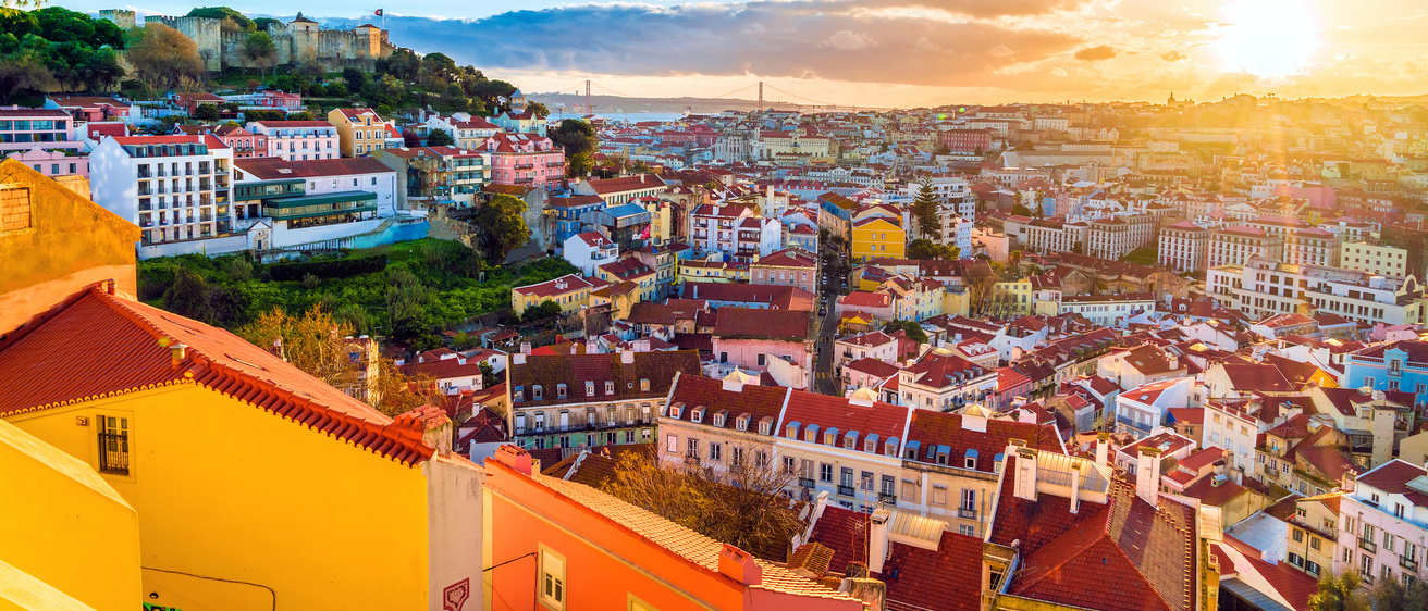 Sunset over the colorful building of Lisbon, Portugal