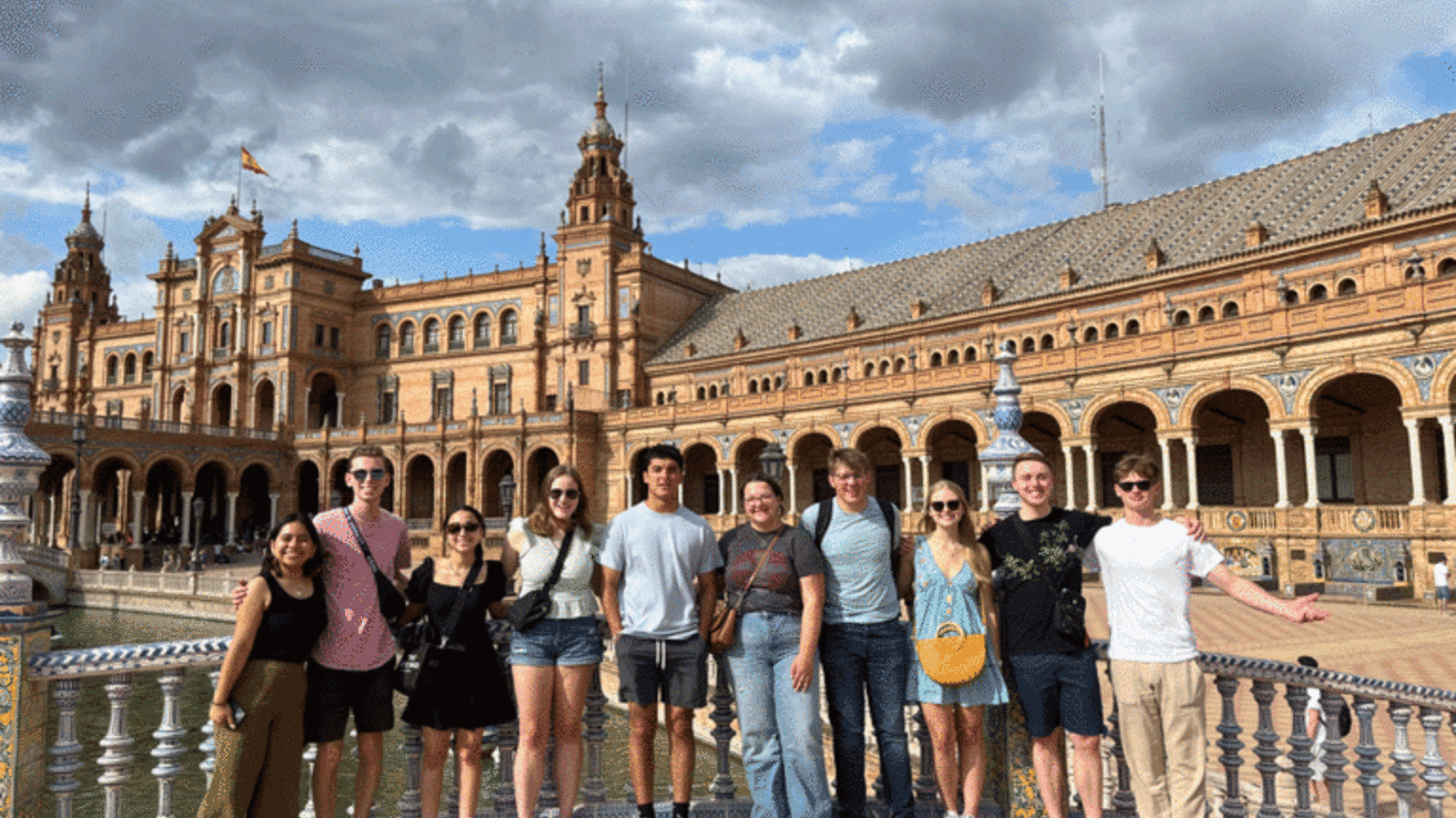 A group of students at the Plaza de España in Seville